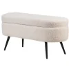 Metalen bank met witte krullen